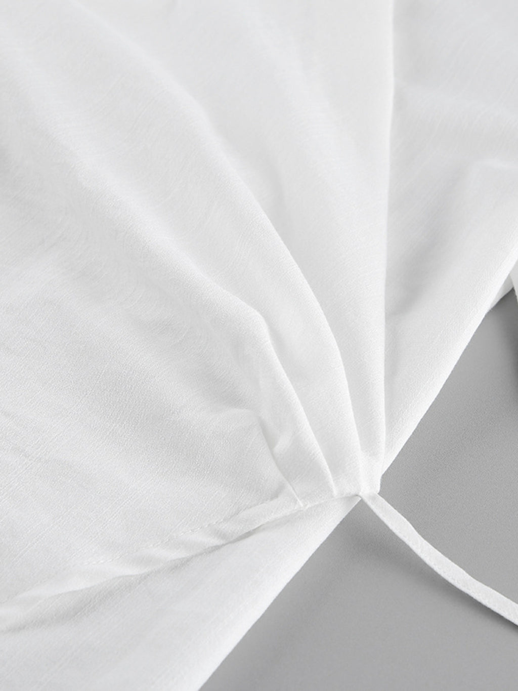 Wrap Top & Wide Leg Pants Set by Belle Bijouix in white fabric with tie detail
