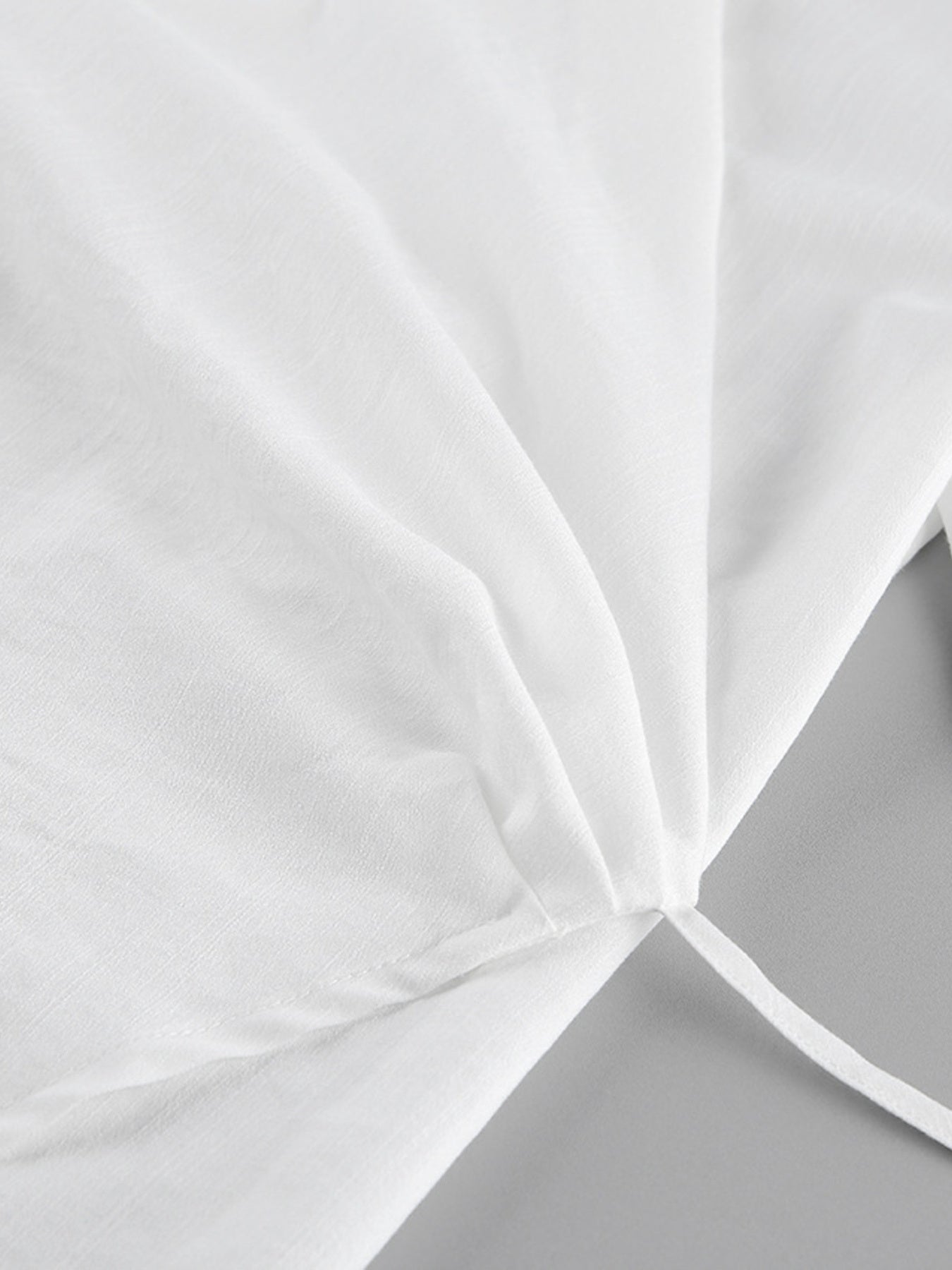 Wrap Top & Wide Leg Pants Set by Belle Bijouix in white fabric with tie detail