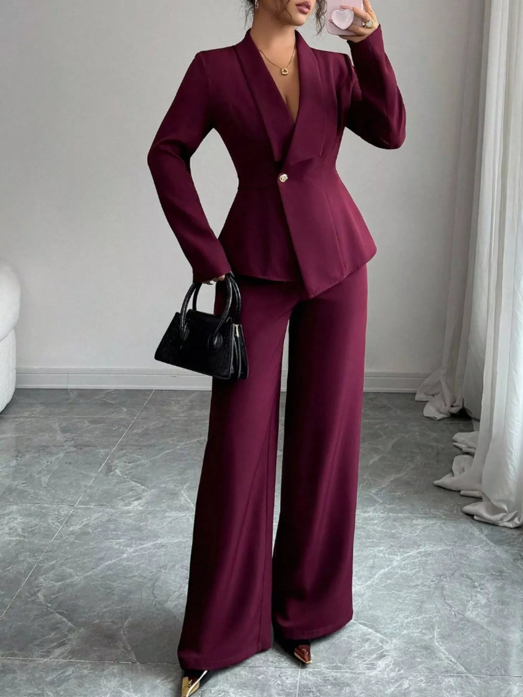 One Button Blazer and Pants Set in burgundy wine color; wide-leg pant suit with a black handbag.
