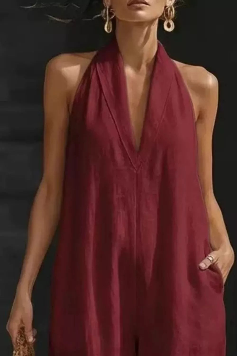 Sleeveless Wide Leg Jumpsuit in burgundy with draped V-neck and pockets, Trendsi