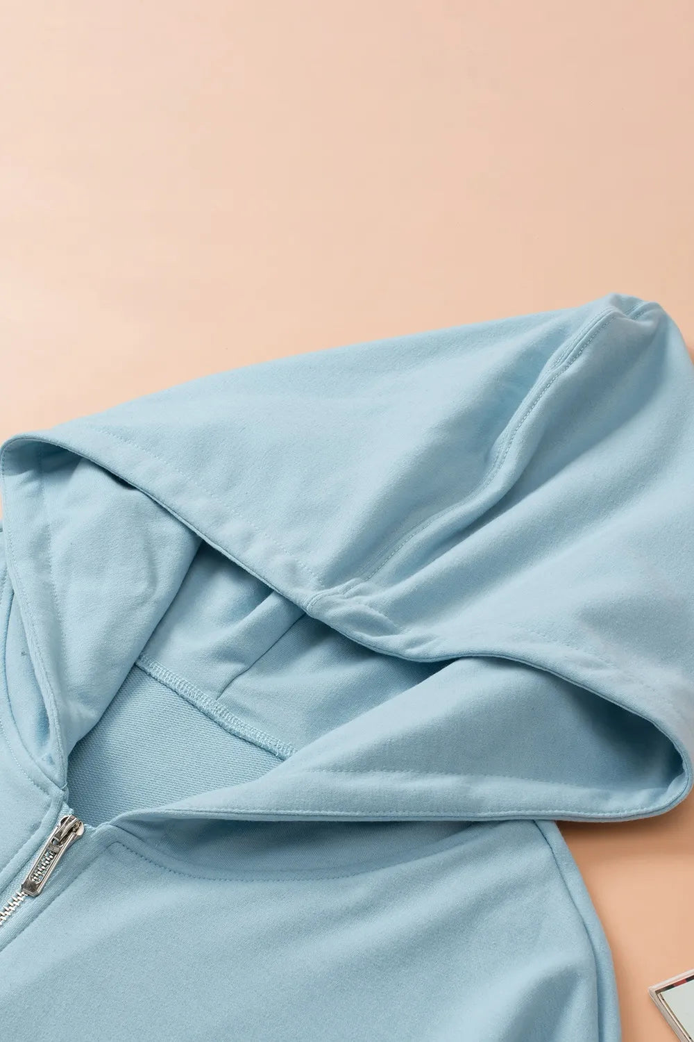 Zip-up hoodie, light blue activewear with hood and visible zipper