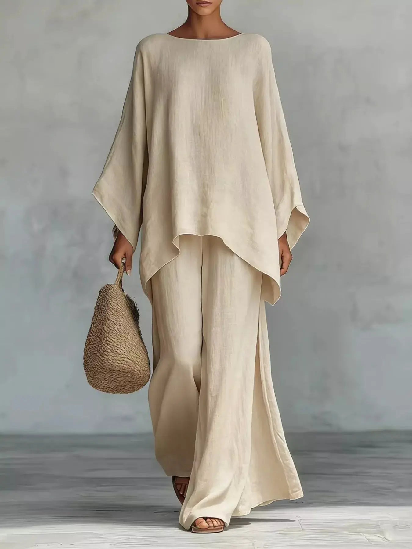 Plus Size Belle Bijouix two-piece round-neck top and wide-leg pants outfit set in cream.