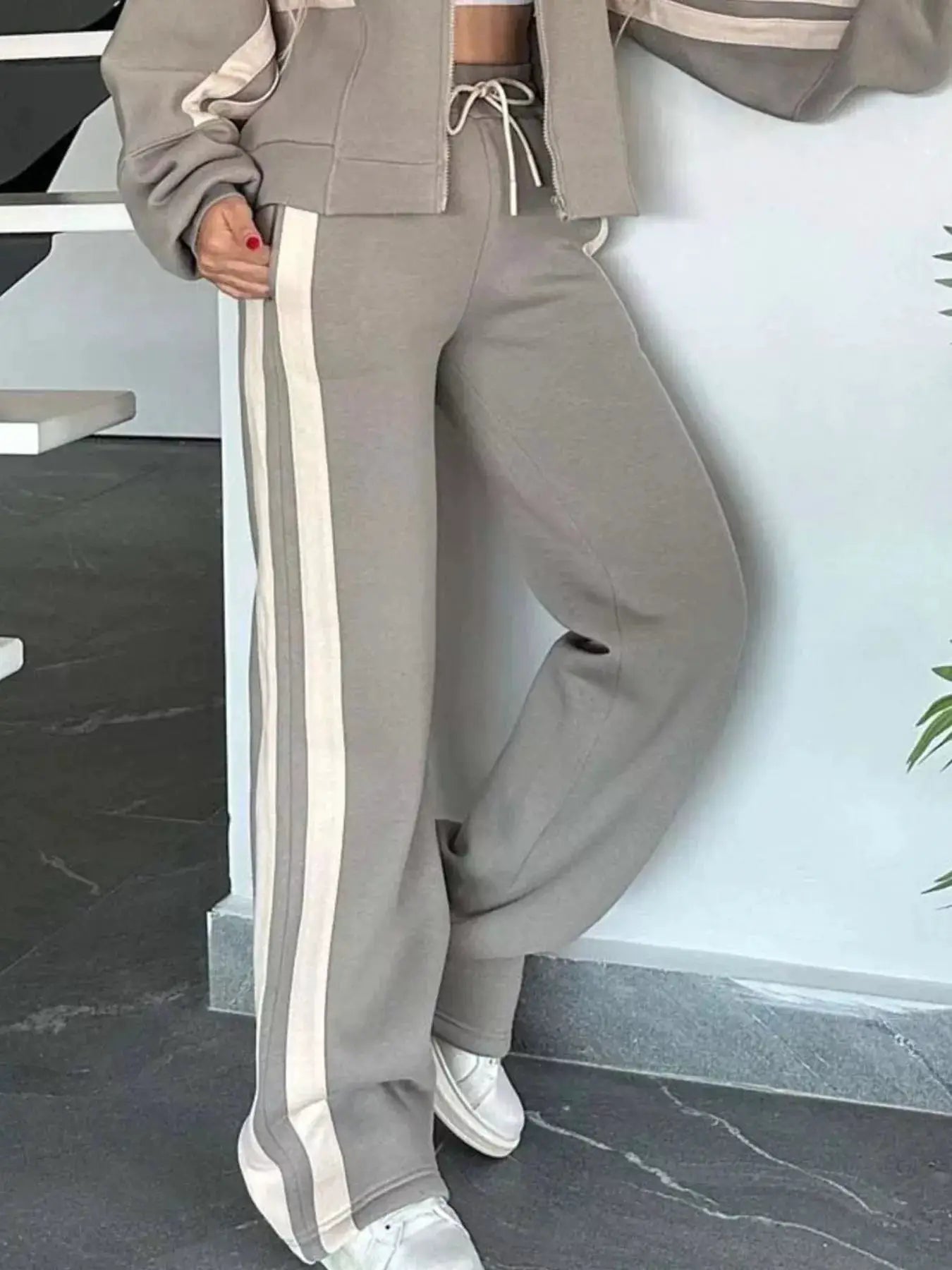 Full-size striped zip-up activewear set; taupe tracksuit with cream side stripes and drawstring jacket by Belle Bijouix.