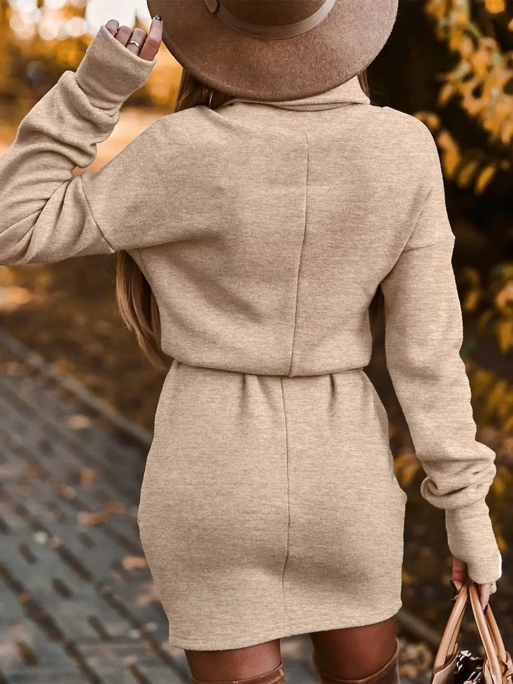 Turtleneck Belted Knit Dress in beige, back view showing belted waist and long sleeves