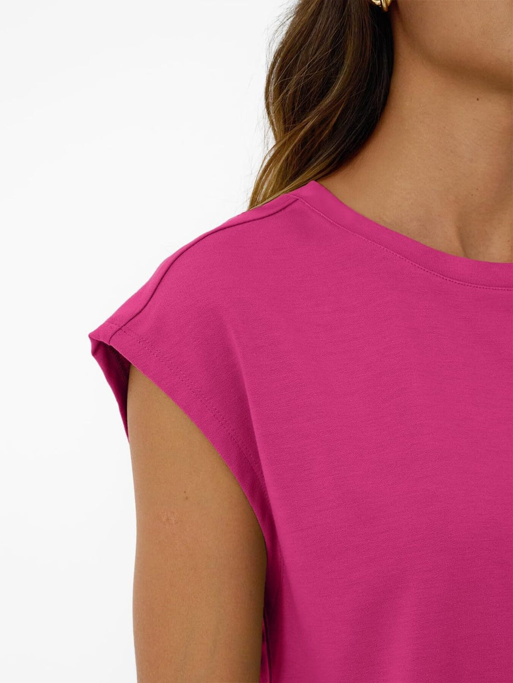 Round-neck cap-sleeve top in pink, close-up shoulder seam view from the set