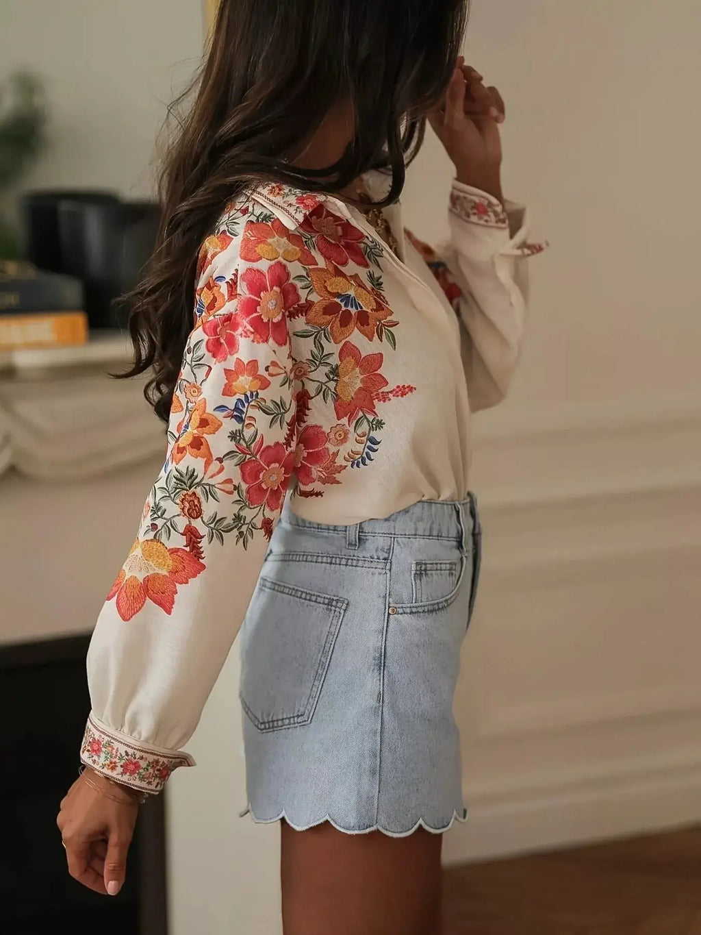 Floral Print Button-Up Shirt by Belle Bijouix, cream base with orange-red flowers.