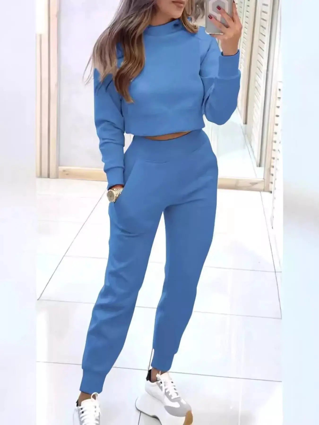 Casual Chic Cropped Sweatshirt and Jogger Set in blue; matching lounge activewear.