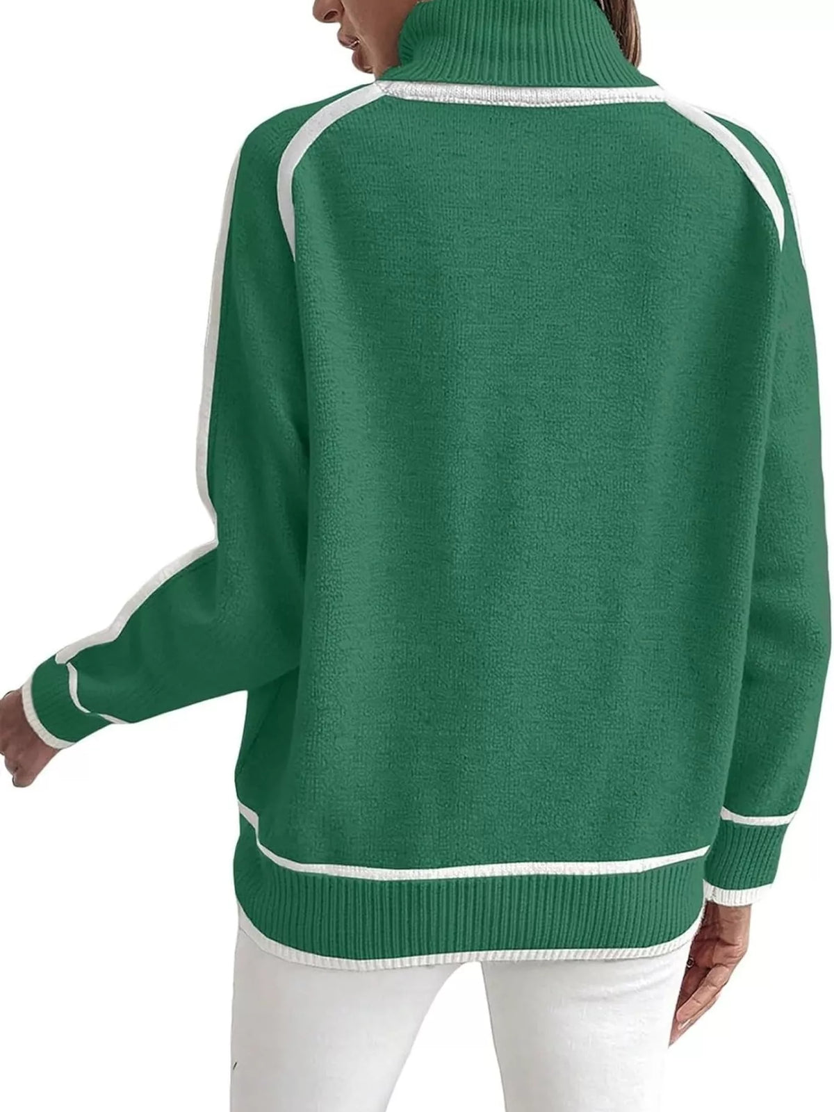 Back view of green turtleneck sweater with white contrast trim and ribbed hem