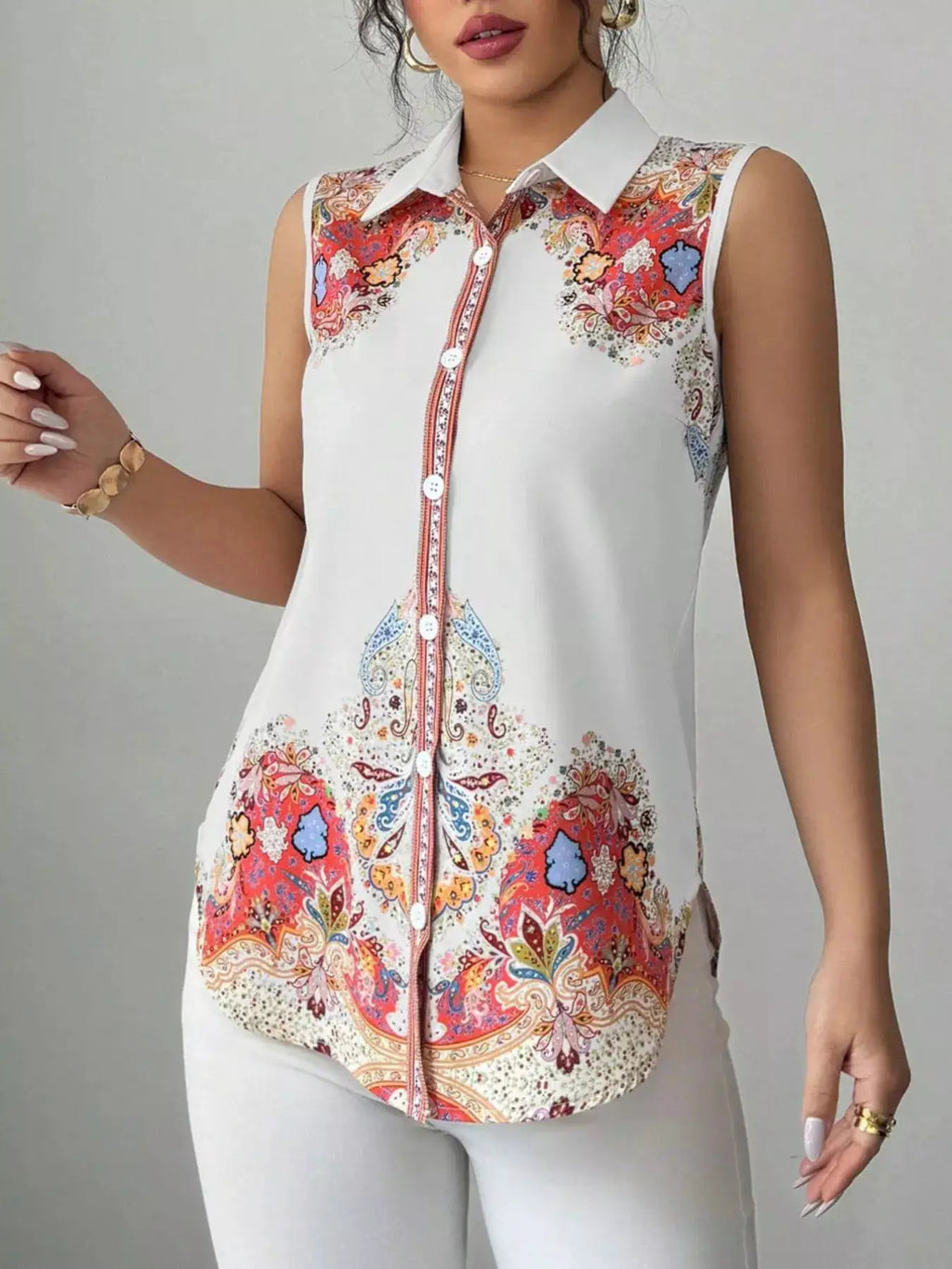 Belle Bijouix sleeveless button-up top in white with vibrant red–orange and blue paisley print