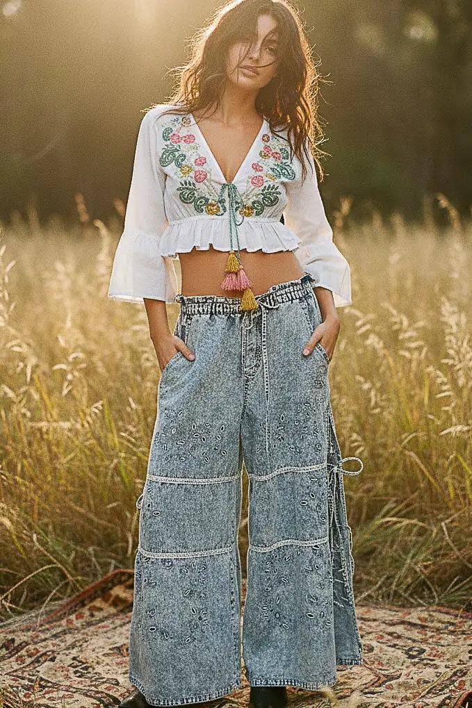 POL Floral Embroidered Cropped Blouse in white with tassel-tie V-neck