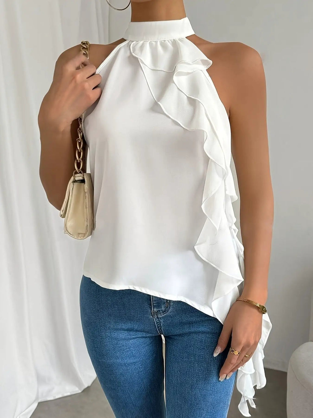 Ruffle halter neck sleeveless blouse in white with cascading front ruffle