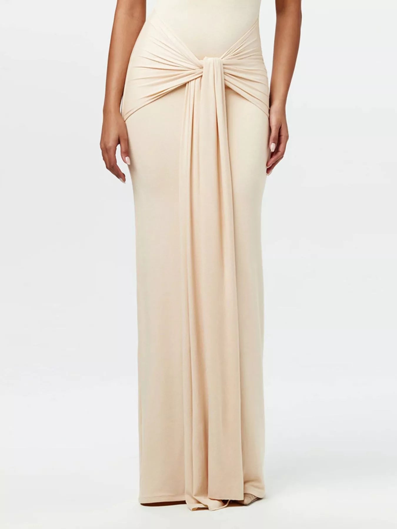 Sleeveless mock-neck knot-front maxi dress in beige by Belle Bijouix