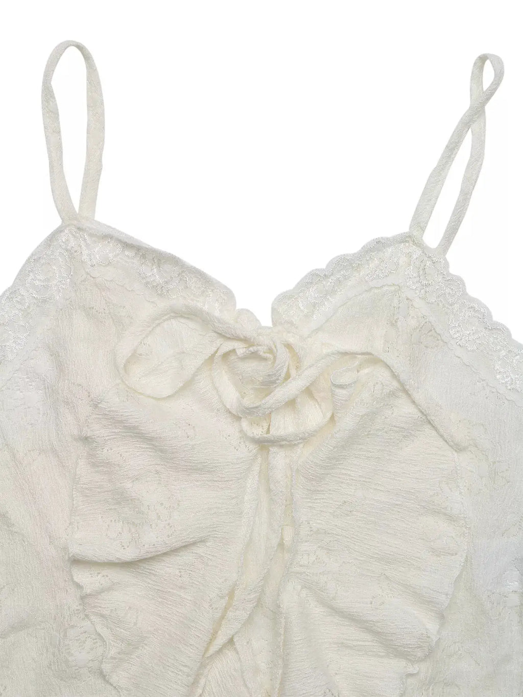 Lace tie-front cami in white with scalloped edges, bow at center, spaghetti straps