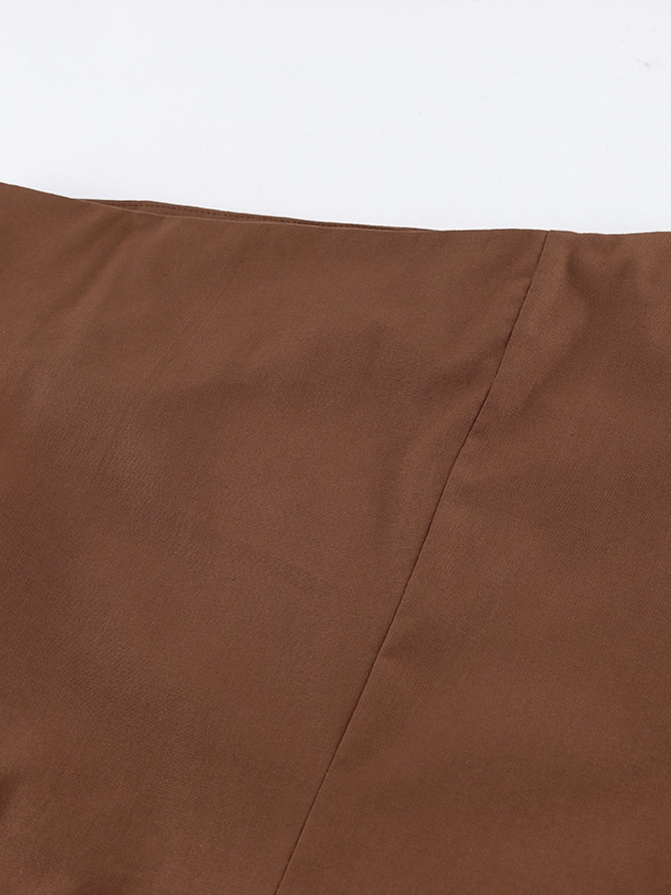Belle Bijouix One-Shoulder Top and Shorts Set in brown fabric with ruched, asymmetrical details