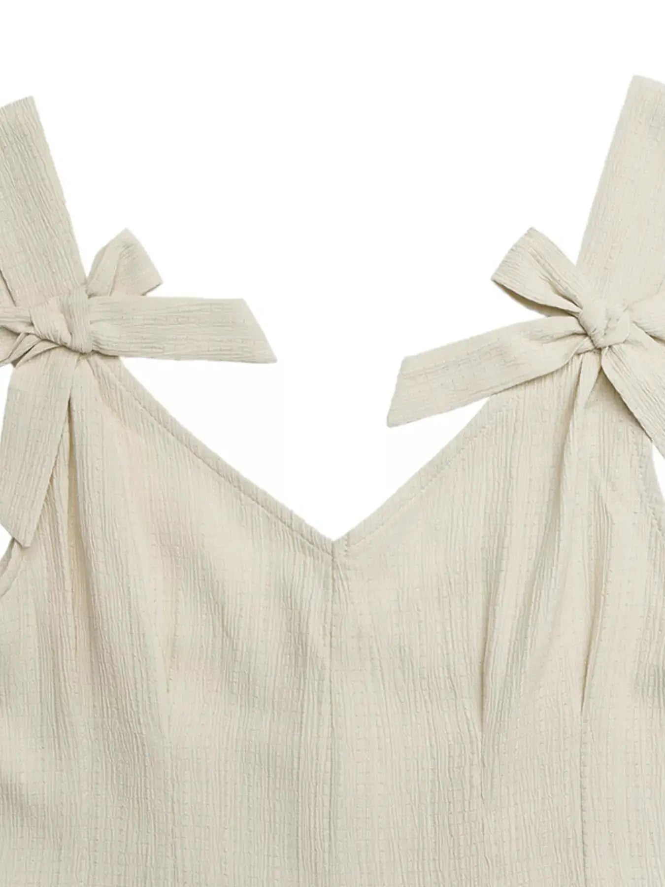 Bowknot strap pleated detail romper in cream with shoulder bows