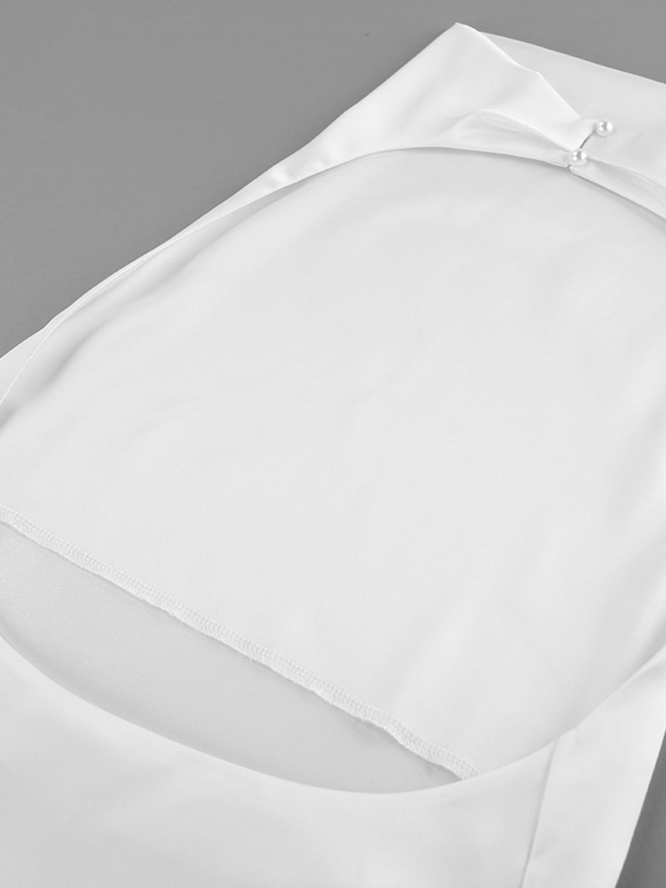 Halter Neck Satin Cami in white with pearl button accents