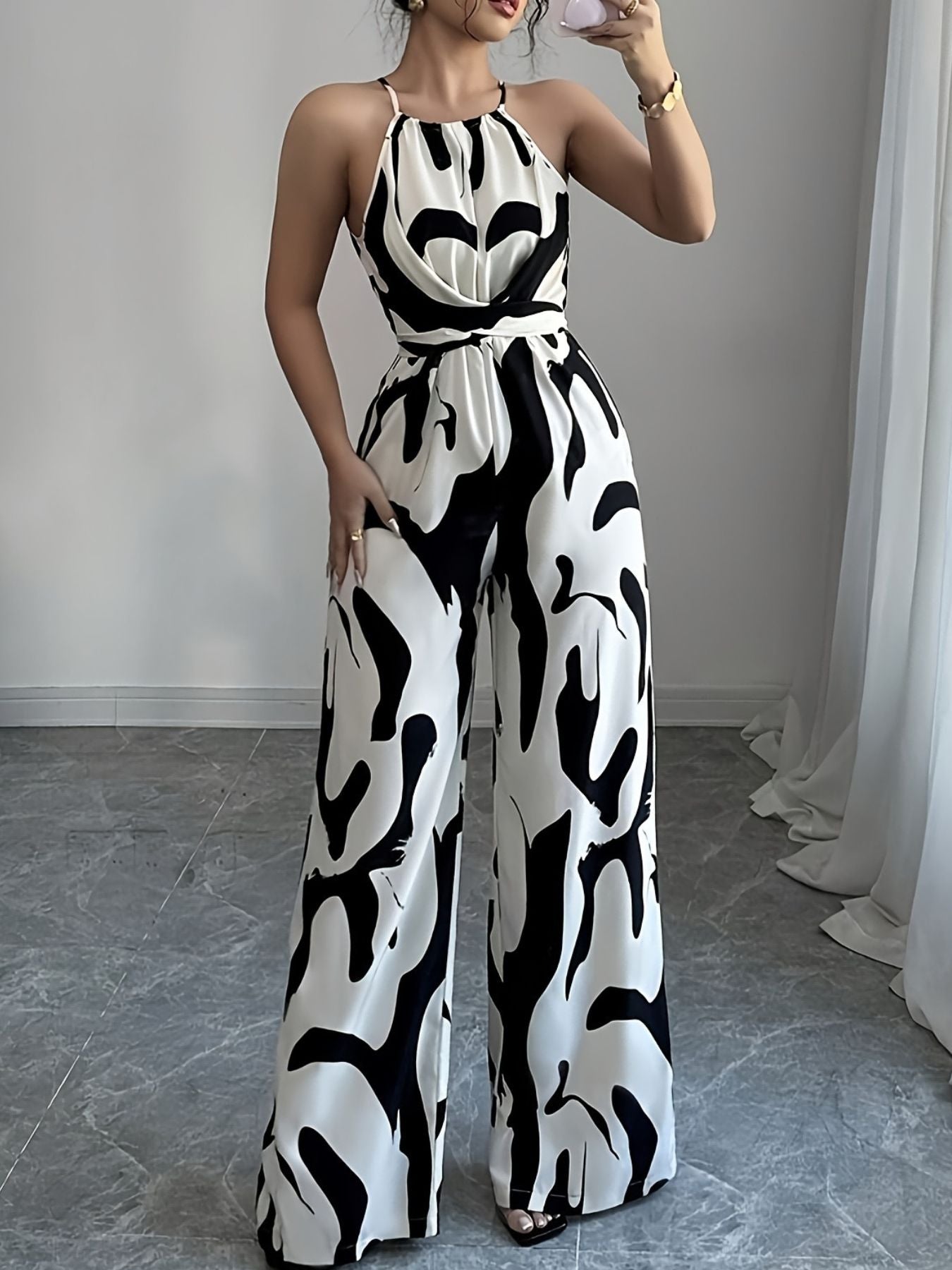 Abstract Print Sleeveless Jumpsuit by Bellebijouix, black-and-white wide-leg one-piece.