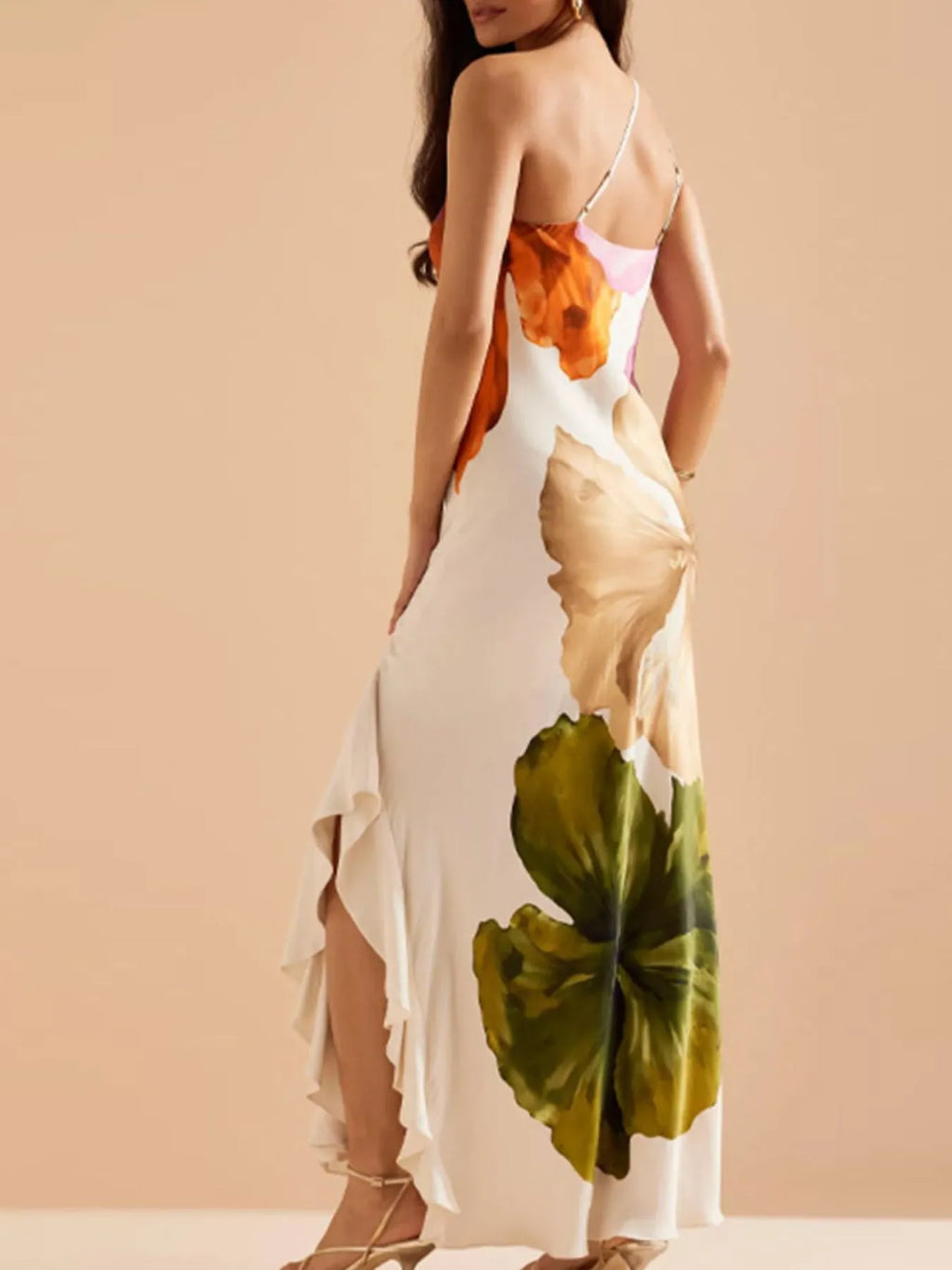 Floral print single-shoulder maxi dress in white with bold orange, pink and green blooms by Trendsi