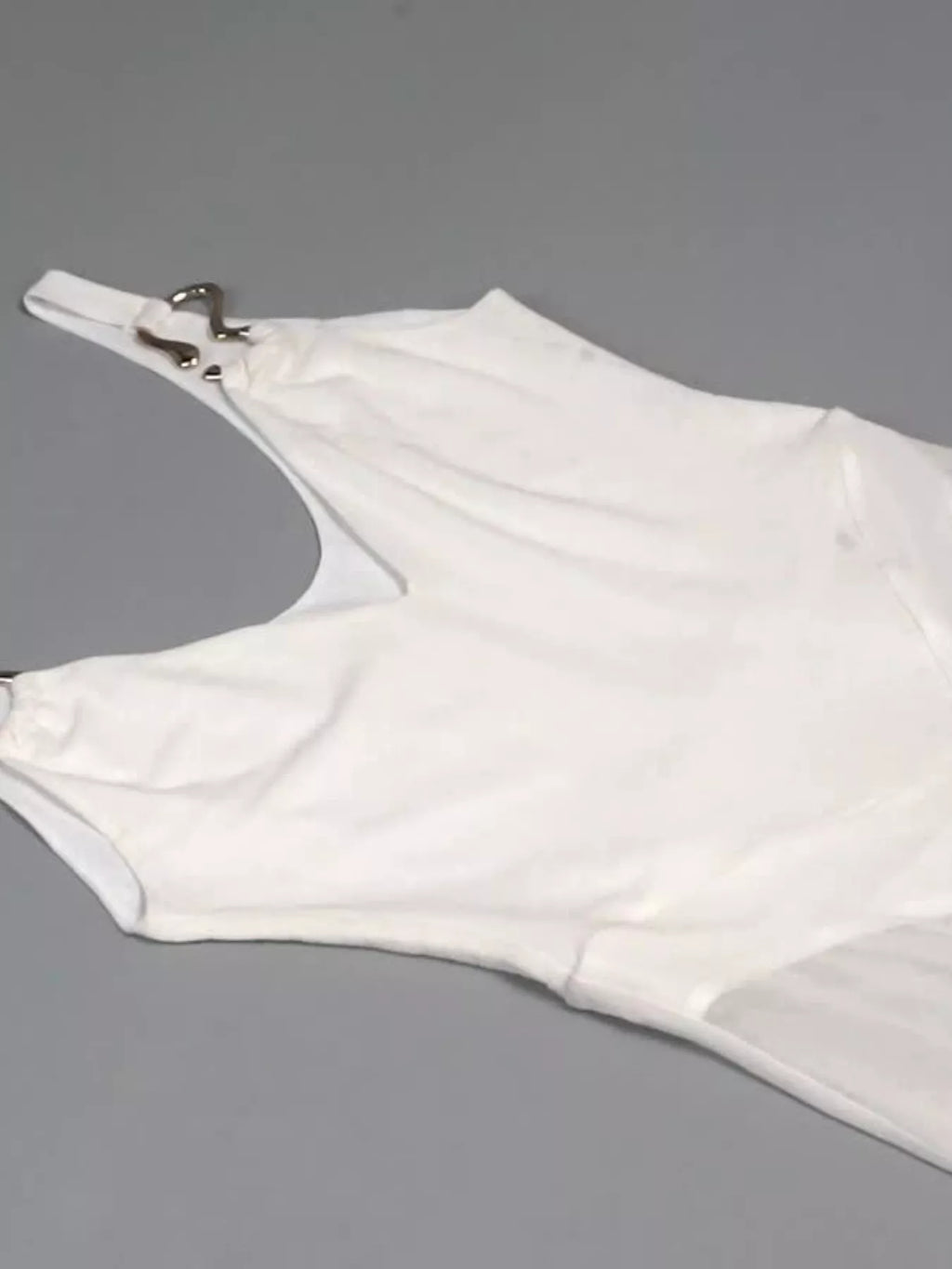 White sleeveless sheer maxi dress with gold hardware and pleated mesh detail