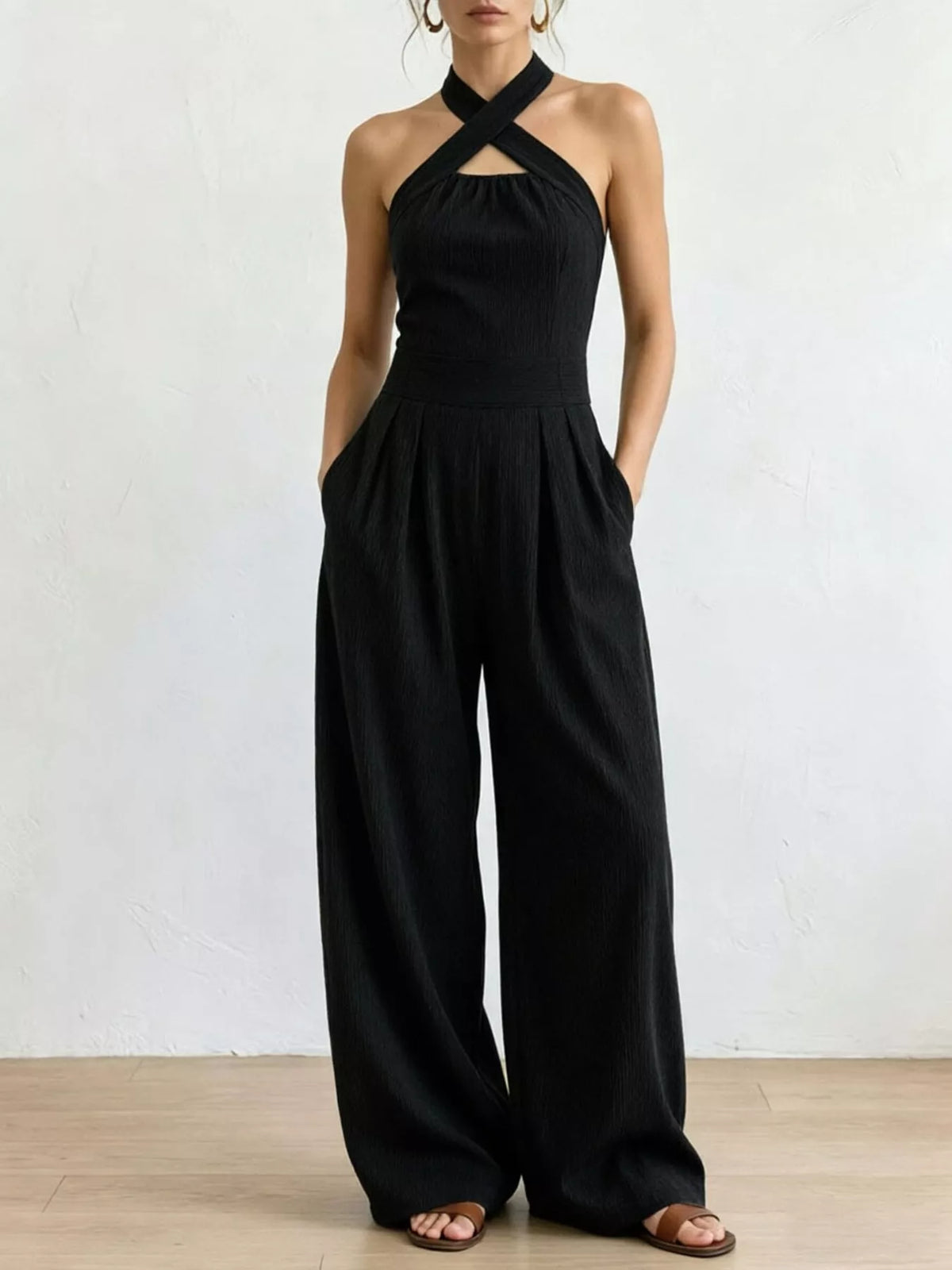 Crisscross Halter Linen Wide-Leg Jumpsuit in Black by Belle Bijouix – view 5 of 45