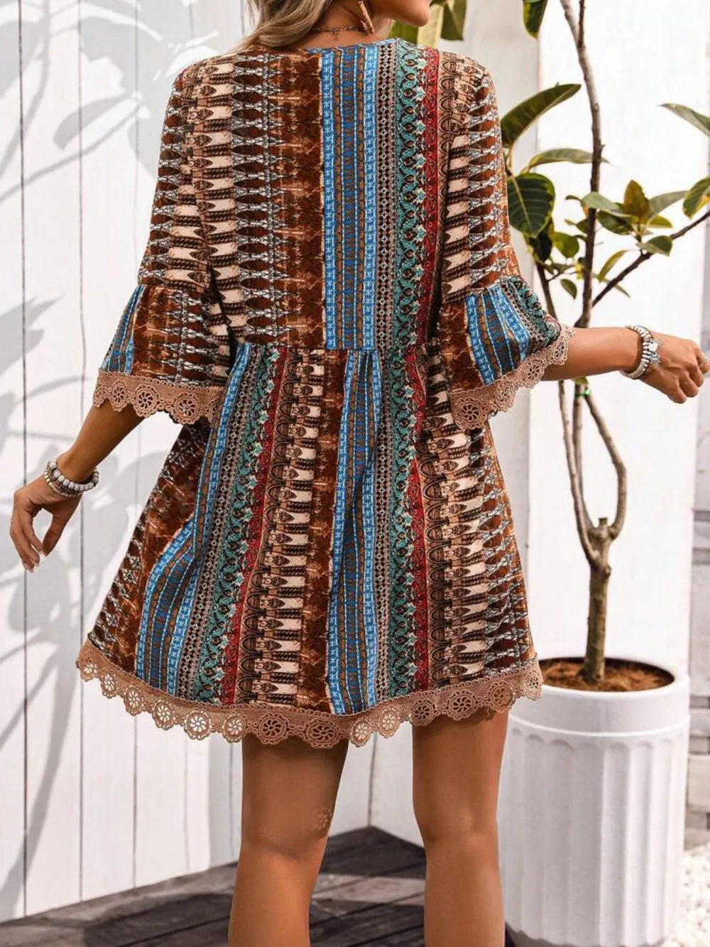 Lace Trim Printed V-Neck 3/4 Sleeve Dress; multicolor boho stripes with cream lace hem.