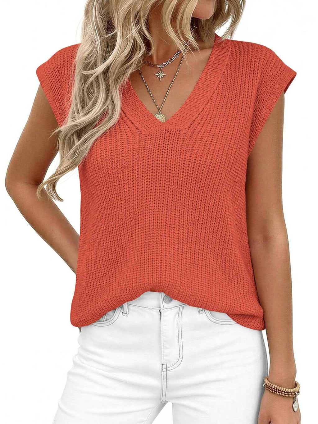 V-Neck sweater vest in coral knit texture, paired with white jeans