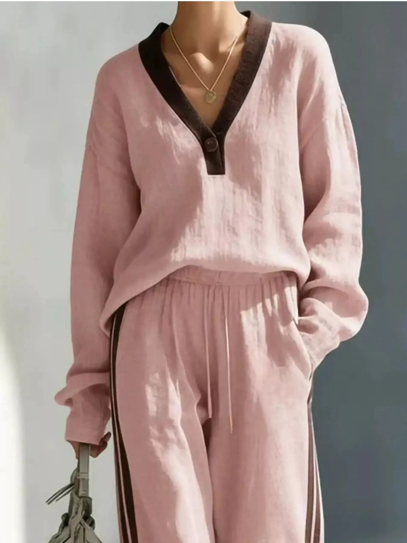Trendsi pink contrast V-neck top and striped pants two-piece loungewear set with dark brown trim