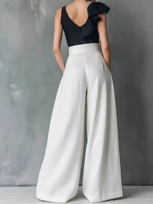 High-Waisted Wide-Leg Pants in white.