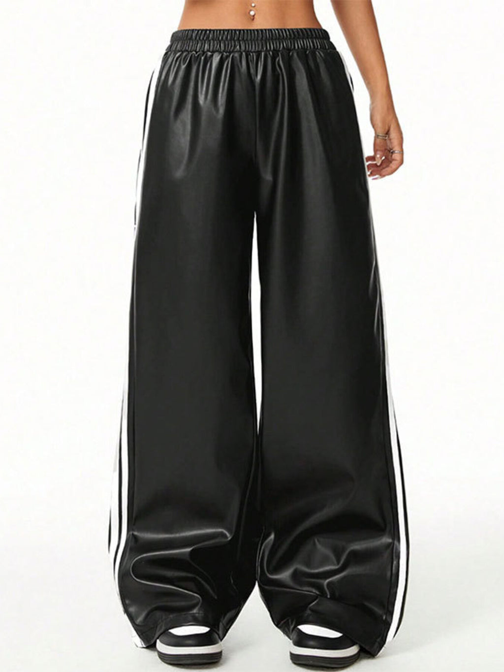 Striped wide-leg faux leather pants by Trendsi, black with white side stripes.