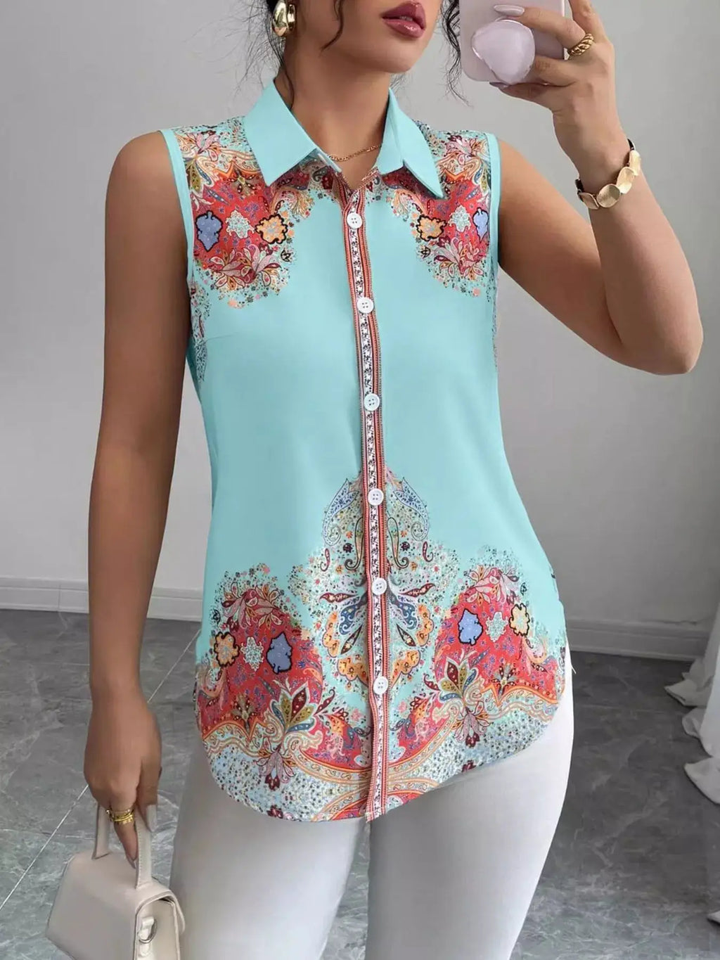 Button Up Sleeveless Shirt in turquoise with a light blue collar and multicolor paisley floral print.