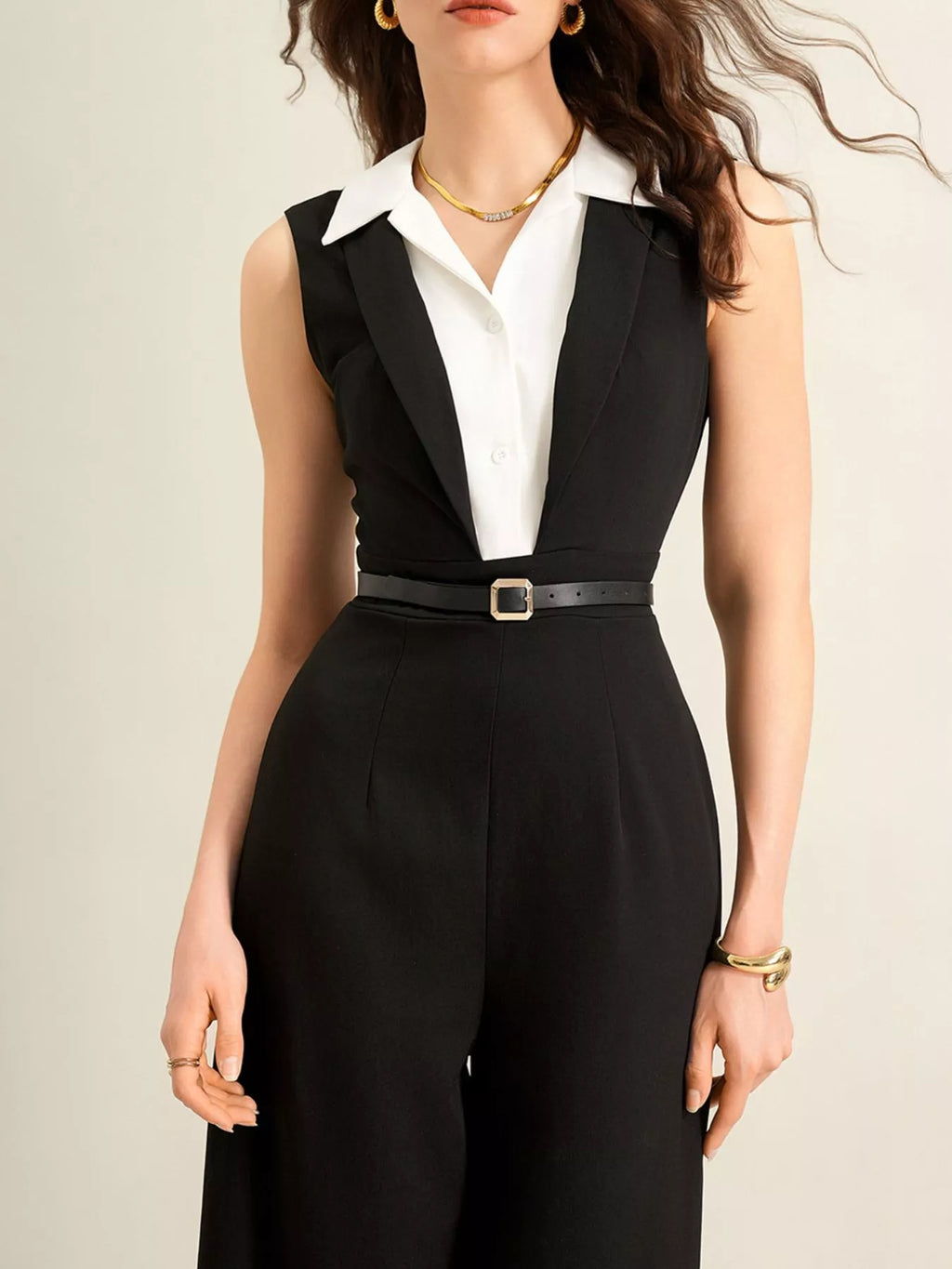 Sleeveless wide-leg jumpsuit in black with white collared shirt and belt by Trendsi