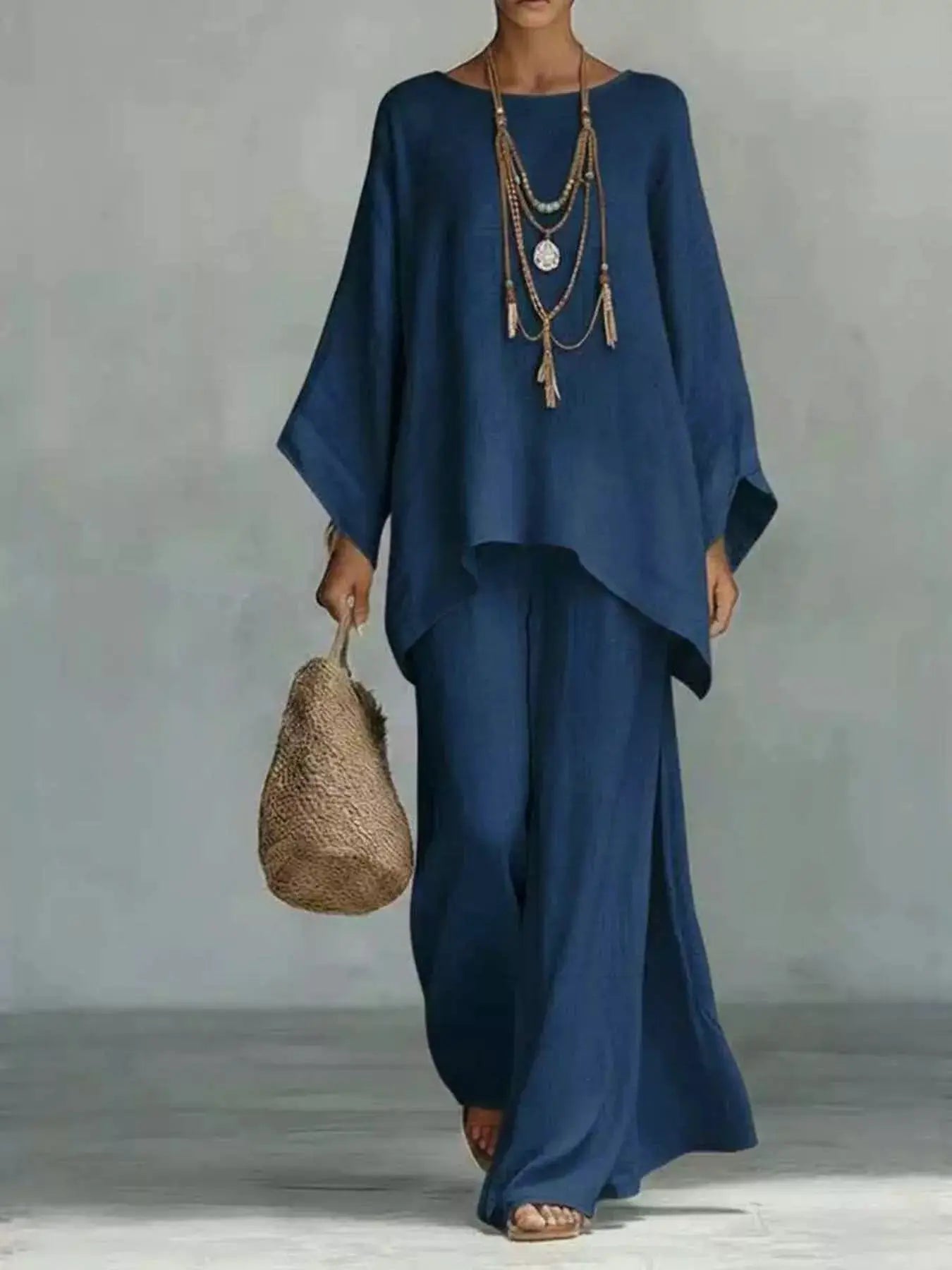 Plus-Size Two-Piece Round-Neck Top & Wide-Leg Pants Set by Belle Bijouix in navy blue.