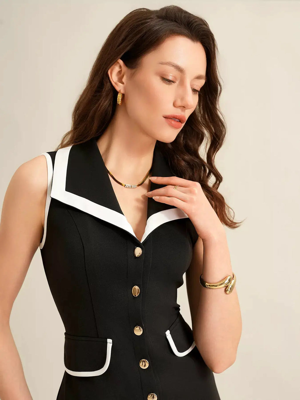 Sleeveless Button-Front Dress by Belle Bijouix; black with white trim.