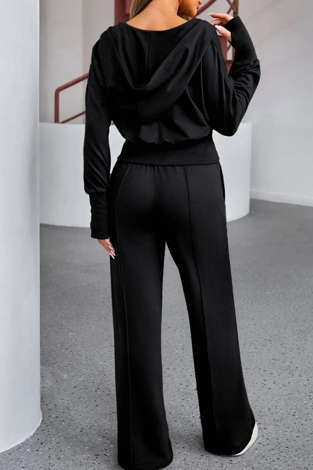 Bellebijouix Zip-Up Hoodie and Pants Active Set in black; drawstring hoodie with zipper.