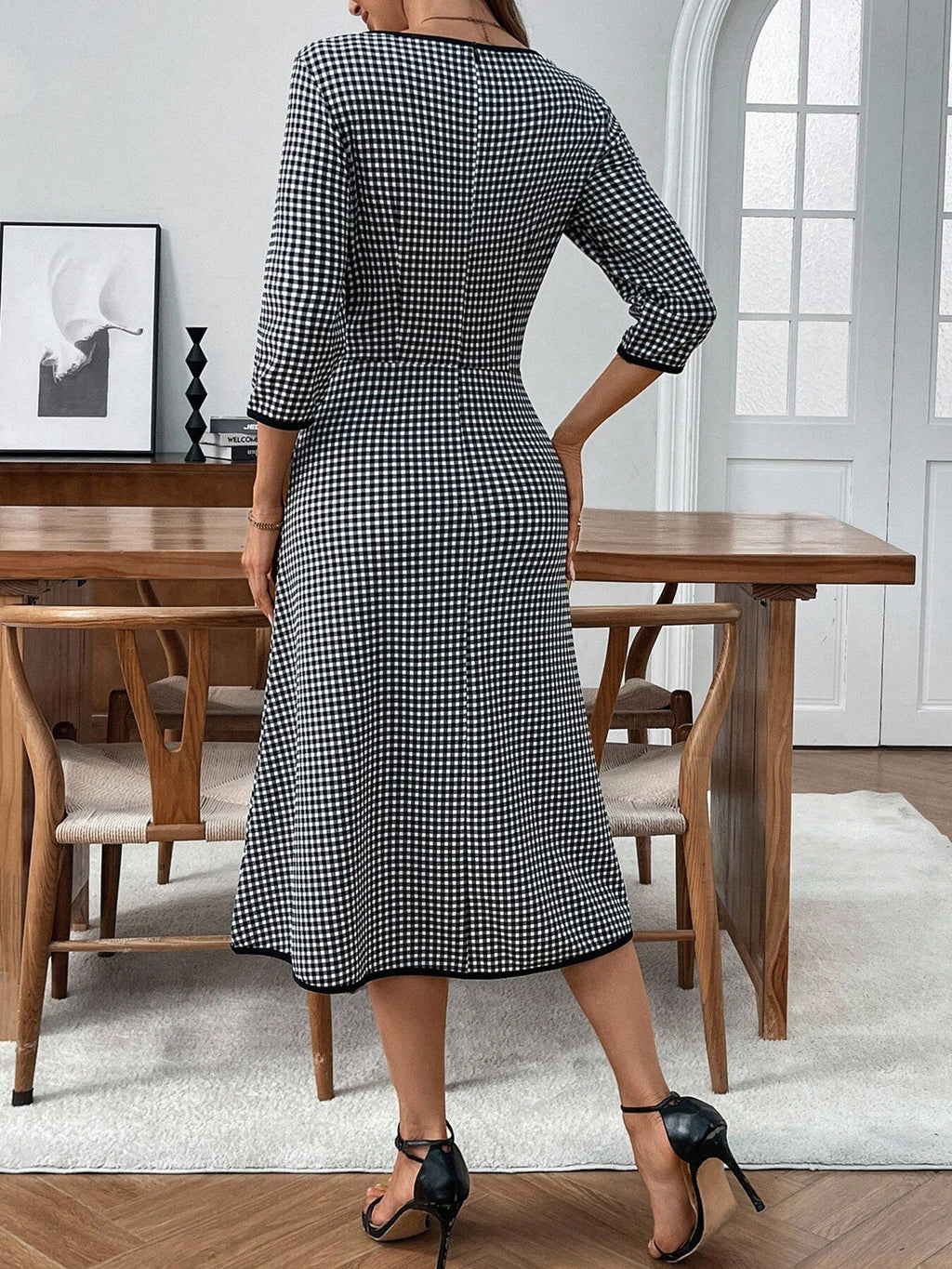 Trendsi plaid round-neck 3/4-sleeve dress in black and white gingham, back view, midi-length.