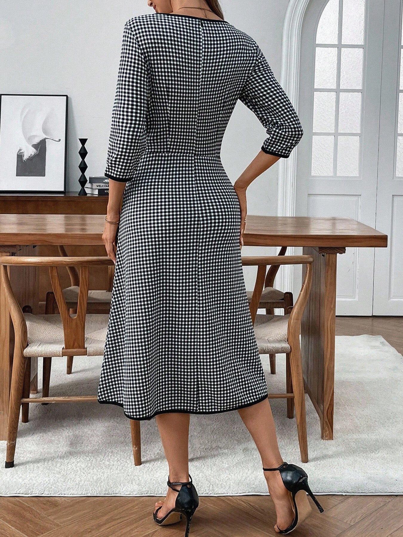 Trendsi plaid round-neck 3/4-sleeve dress in black and white gingham, back view, midi-length.