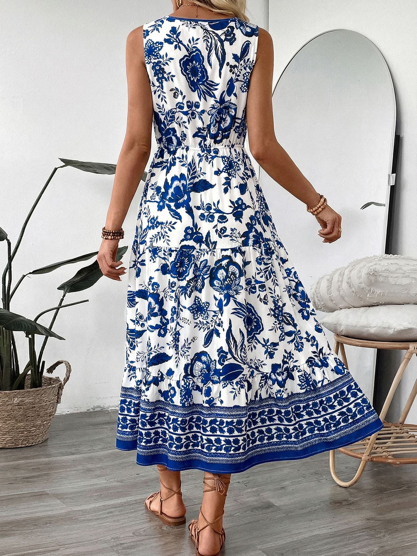 DRESS: Bellebijouix floral print sleeveless white‑and‑blue midi dress with tiered skirt