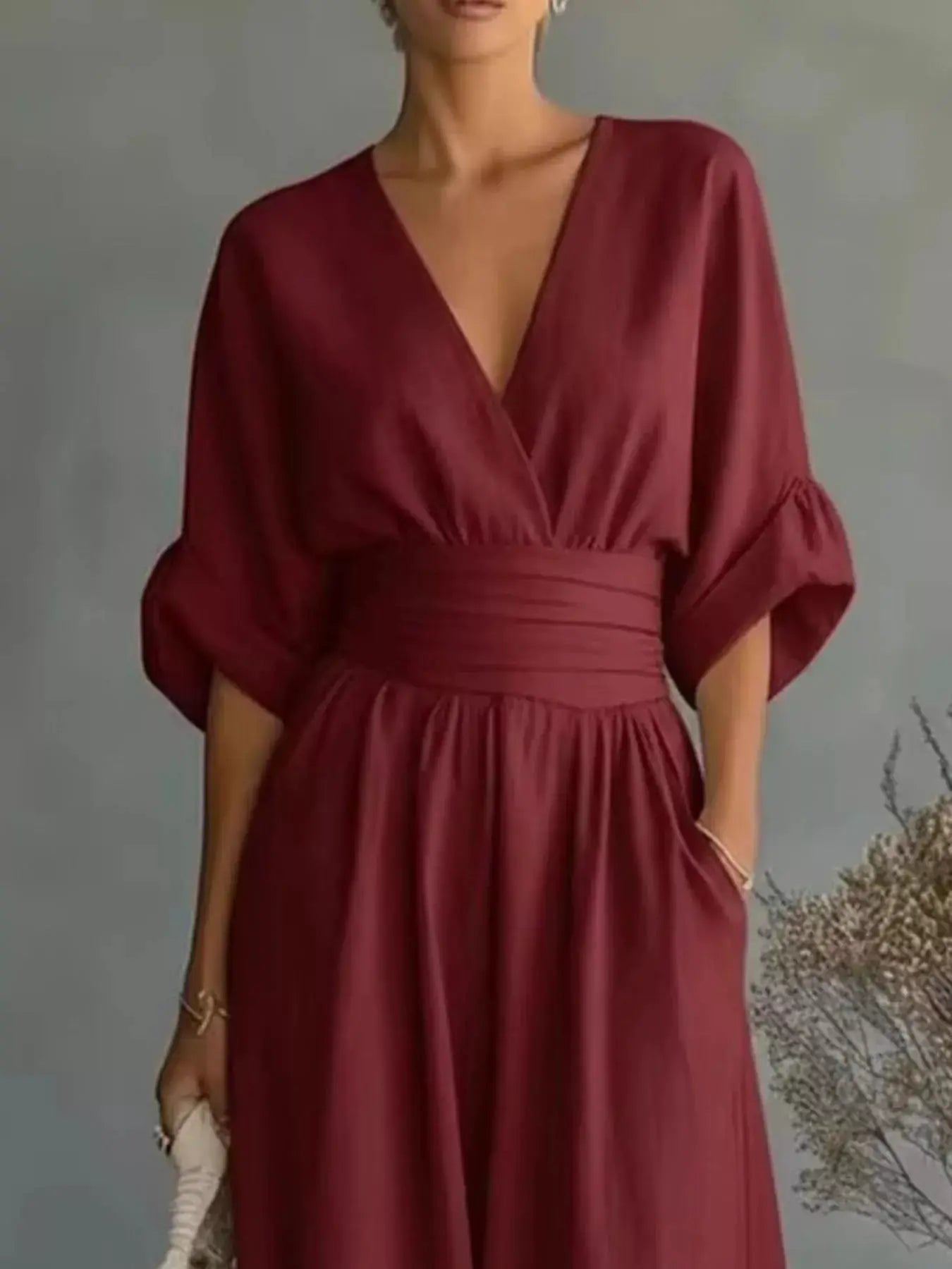 Full Size Half Sleeve Wide Leg Jumpsuit by Belle Bijouix, burgundy plus-size one-piece with deep V-neck.