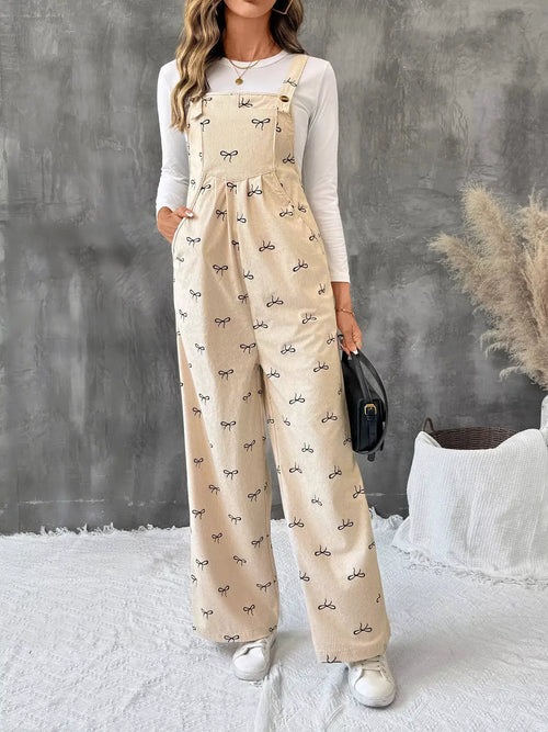 Bow Wide Leg Corduroy Overalls by Belle Bijouix in beige corduroy with tiny bow print and pockets.