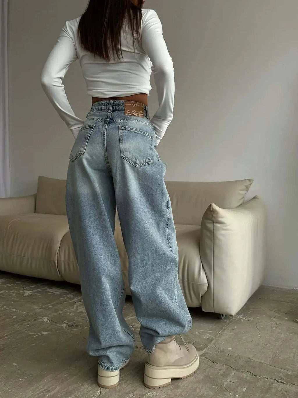 Wide-leg jeans by Belle Bijouix in light wash denim with back pockets