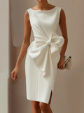 Plus-size white sleeveless dress with a large waist bow and front-knot detail, knee-length with a slit