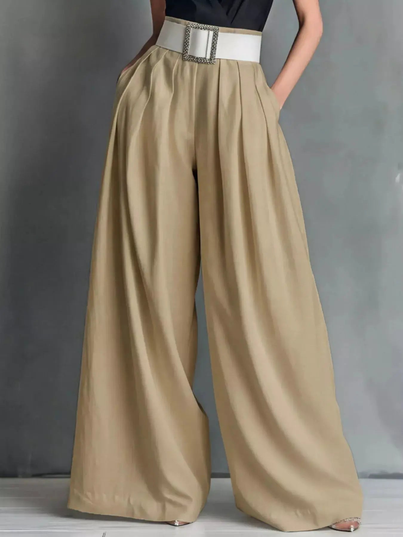 High-Waisted Wide-Leg Pants by Trendsi; beige wide-leg bottoms with white jeweled-buckle belt.