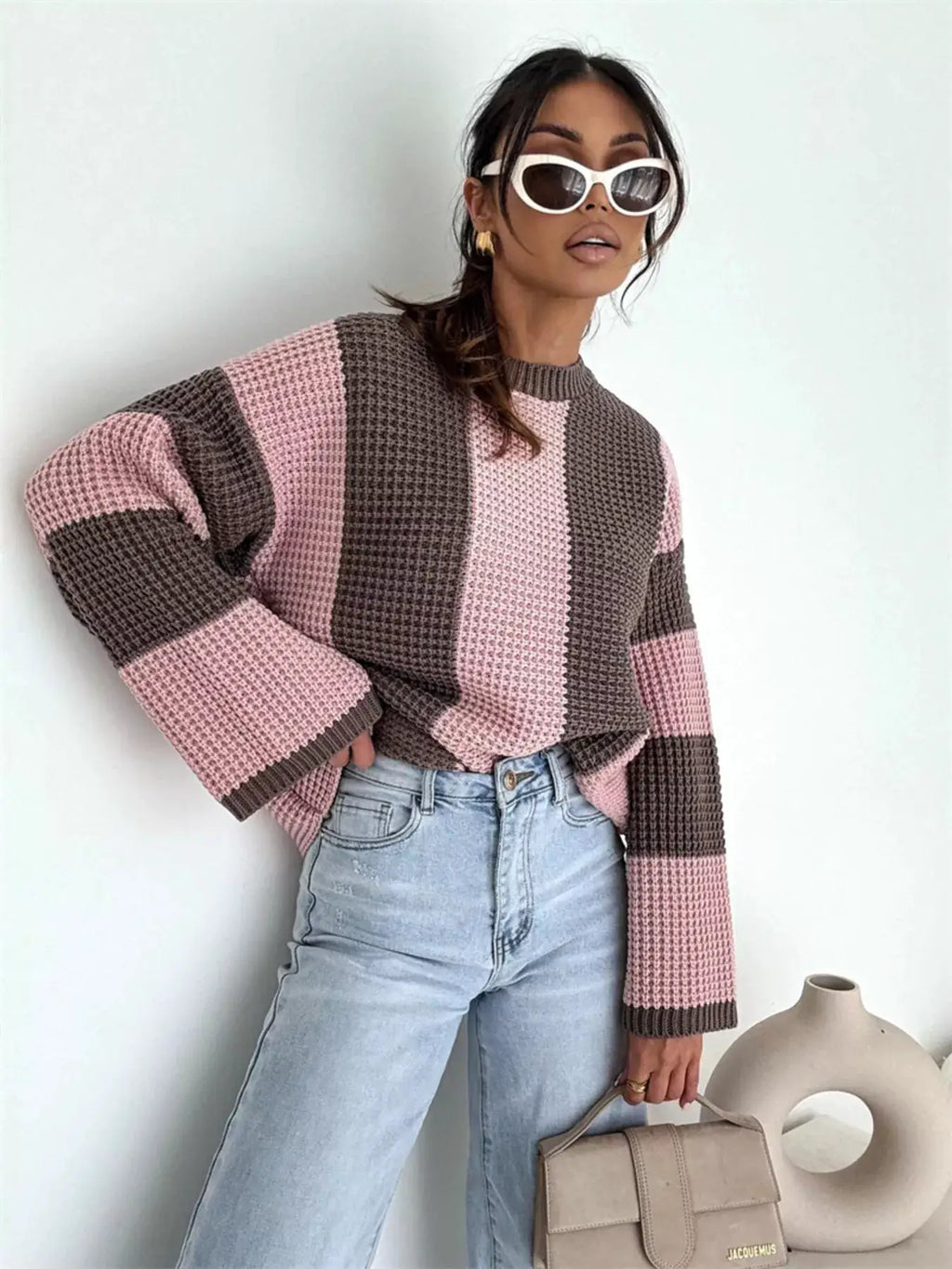 Color Block Long Sleeve Sweater in pink and brown; oversized knit with chunky texture, paired with a Jacquemus bag.