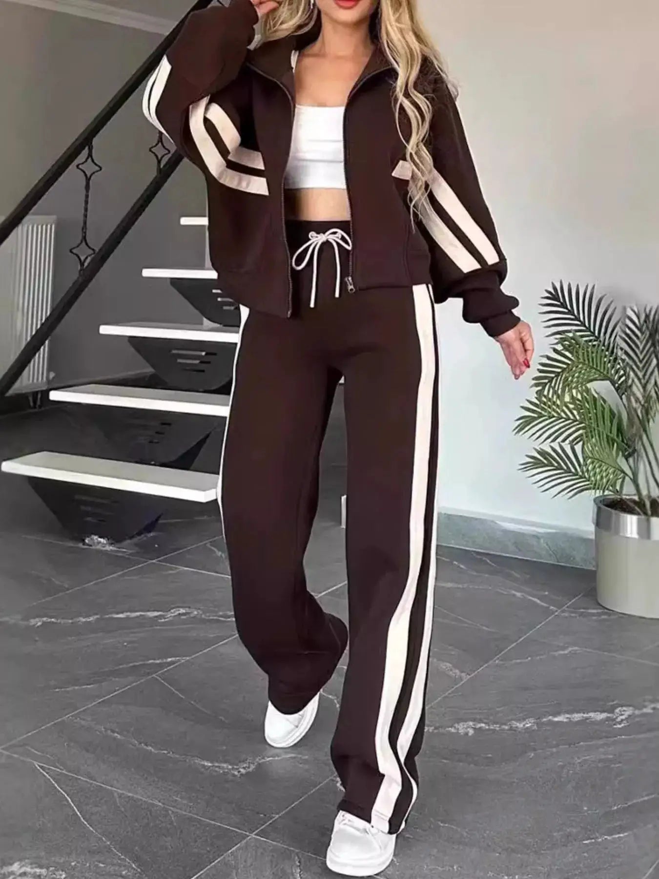 Full-size striped zip-up outerwear and pants set in brown with white stripes, plus size Belle Bijouix activewear.