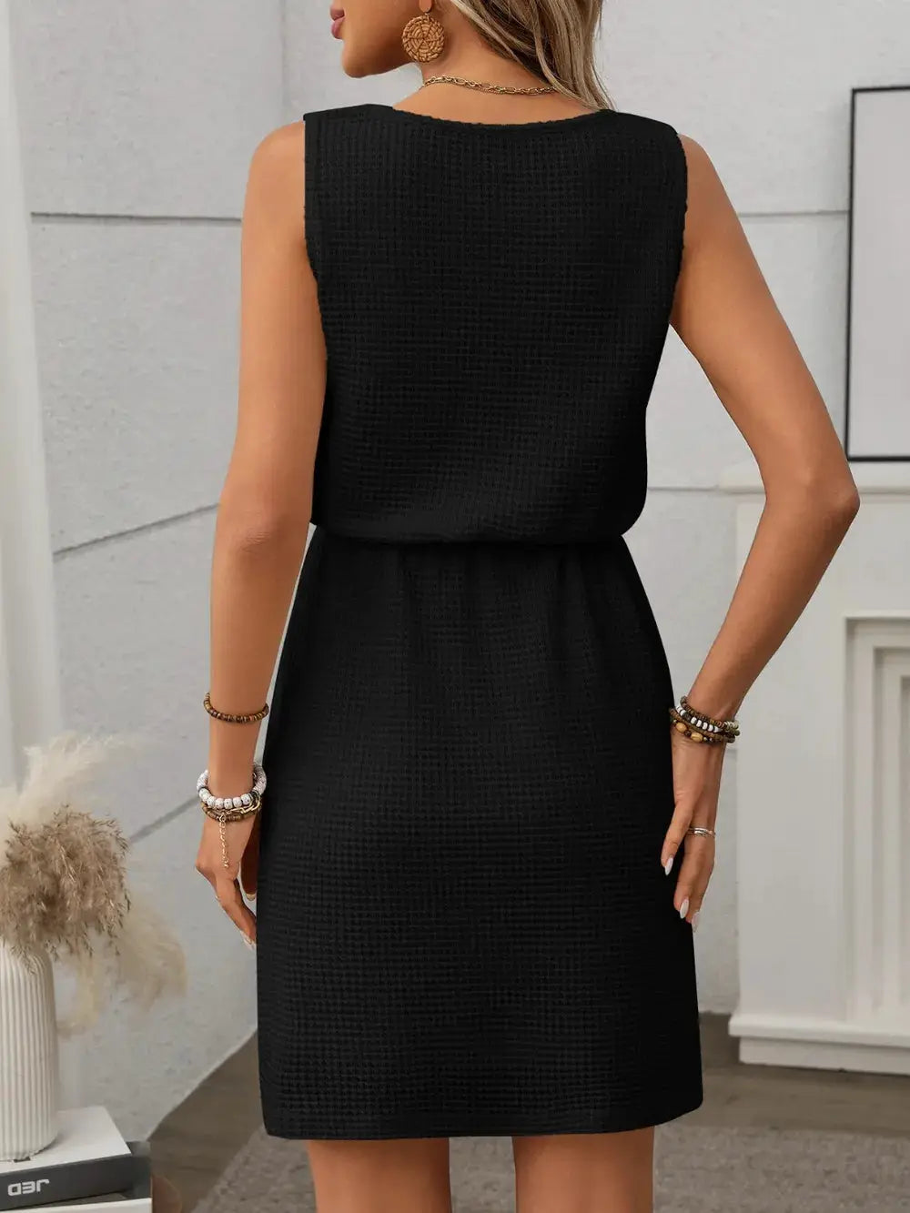 Dress: Belle Bijouix black waffle-knit drawstring mini tank dress, back view