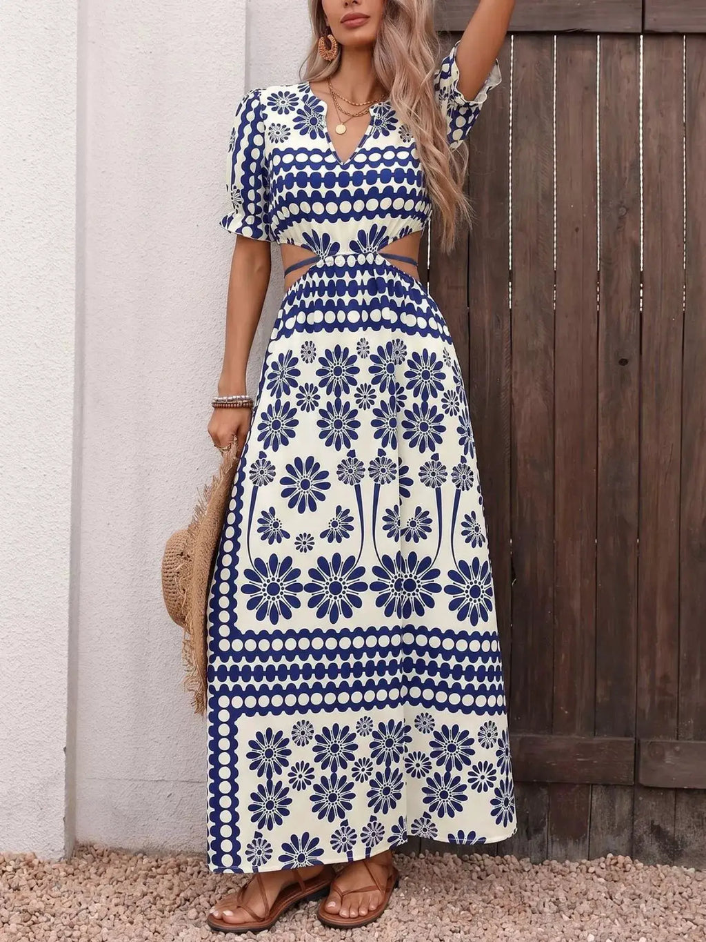 Floral print cutout-waist maxi dress by Belle Bijouix in blue and ivory with a V-neck and side slit
