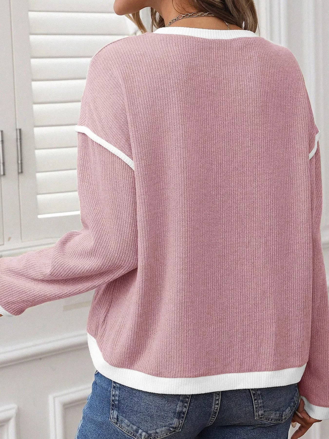 Contrast Color Trim Knit Drop Shoulder Loose Top pink knit sweater with white trim, back view