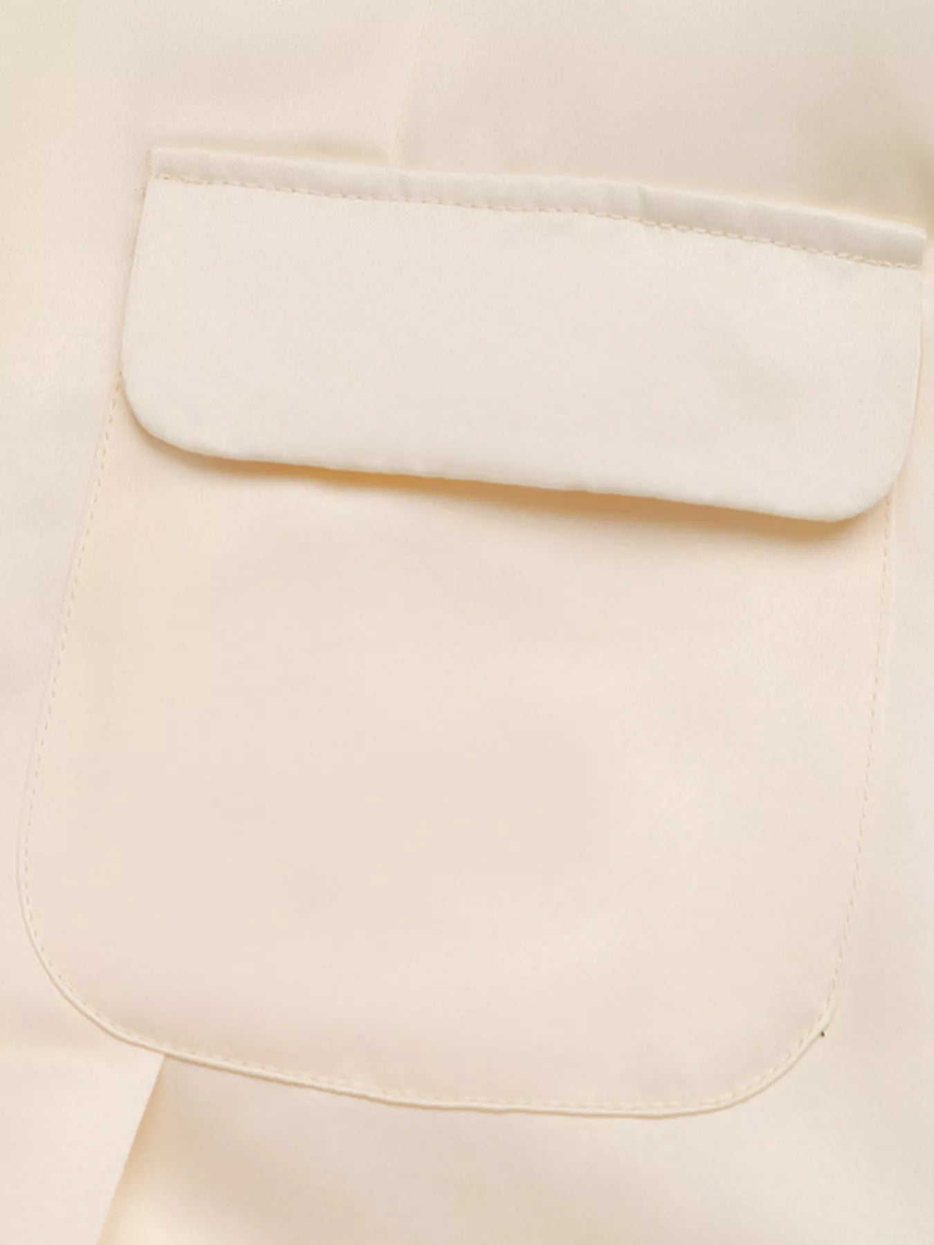 Sleeveless A-line Midi Dress with Front Pockets in cream by Belle Bijouix