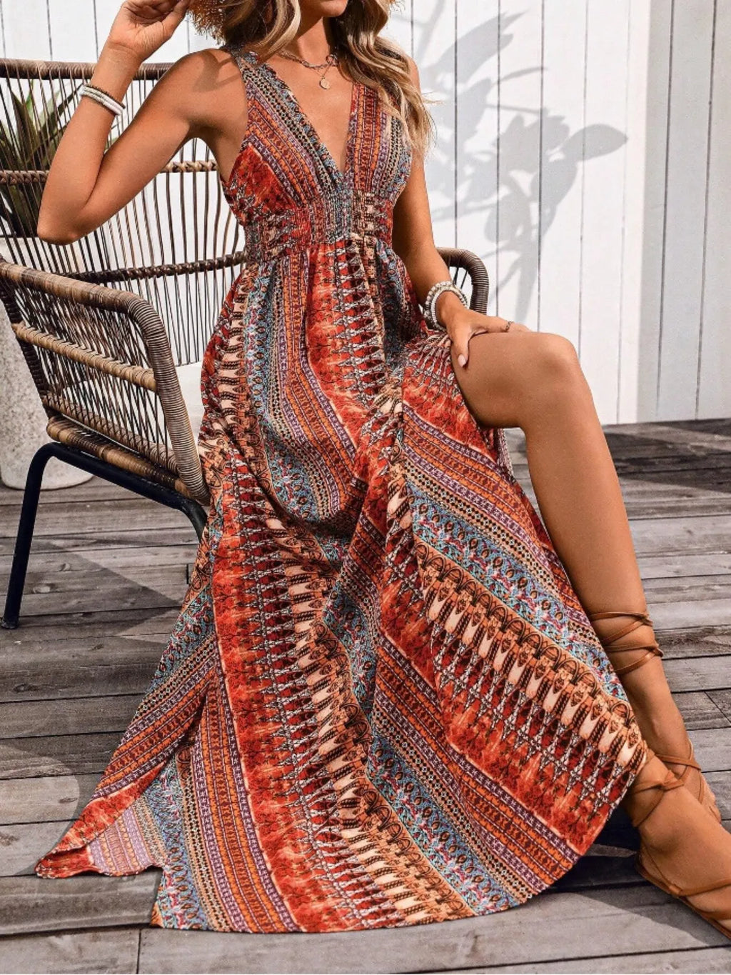 Tied back printed sleeveless maxi dress with slit in orange, teal and blue boho pattern by Bellebijouix