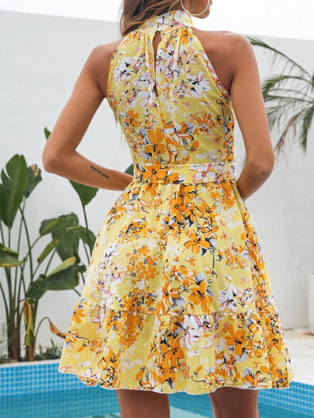 Floral Print Halter Neck Mini Dress by Bellebijouix, yellow with orange and white flowers; ruffled tied detail.